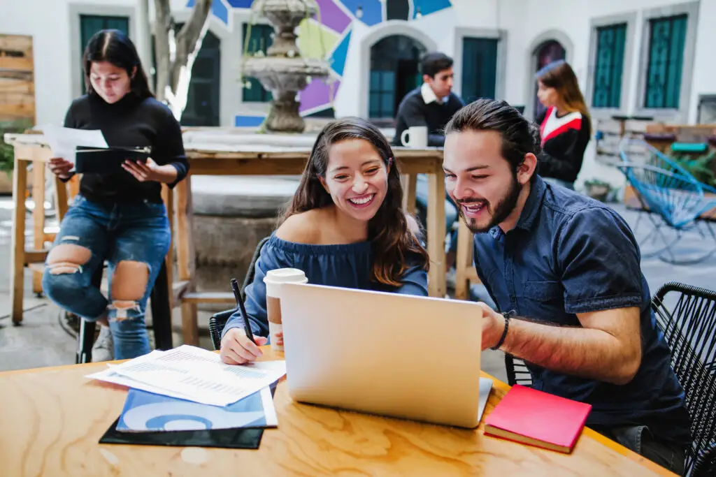 Happy young mexican college students