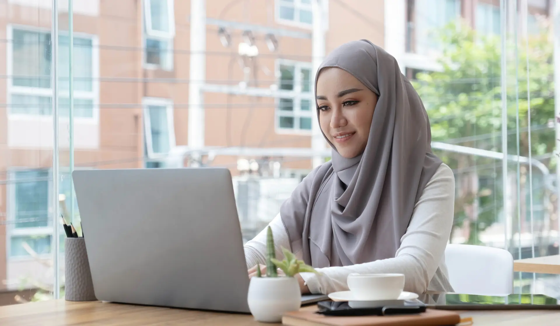 Asian Muslim business woman in hijab headscarf