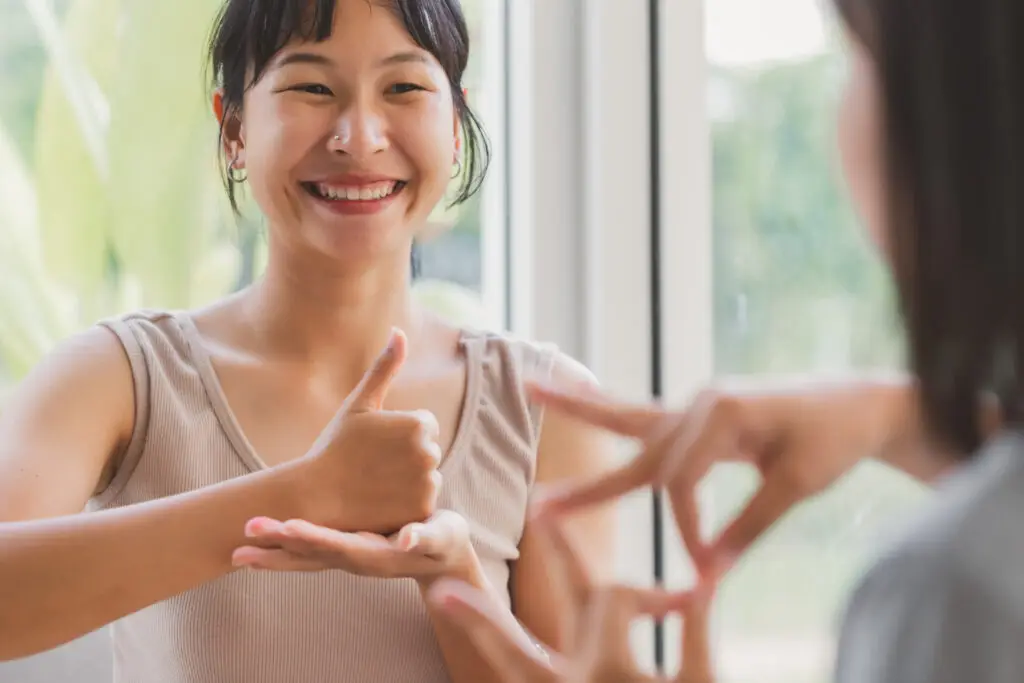 an interpreter communicating in sign language