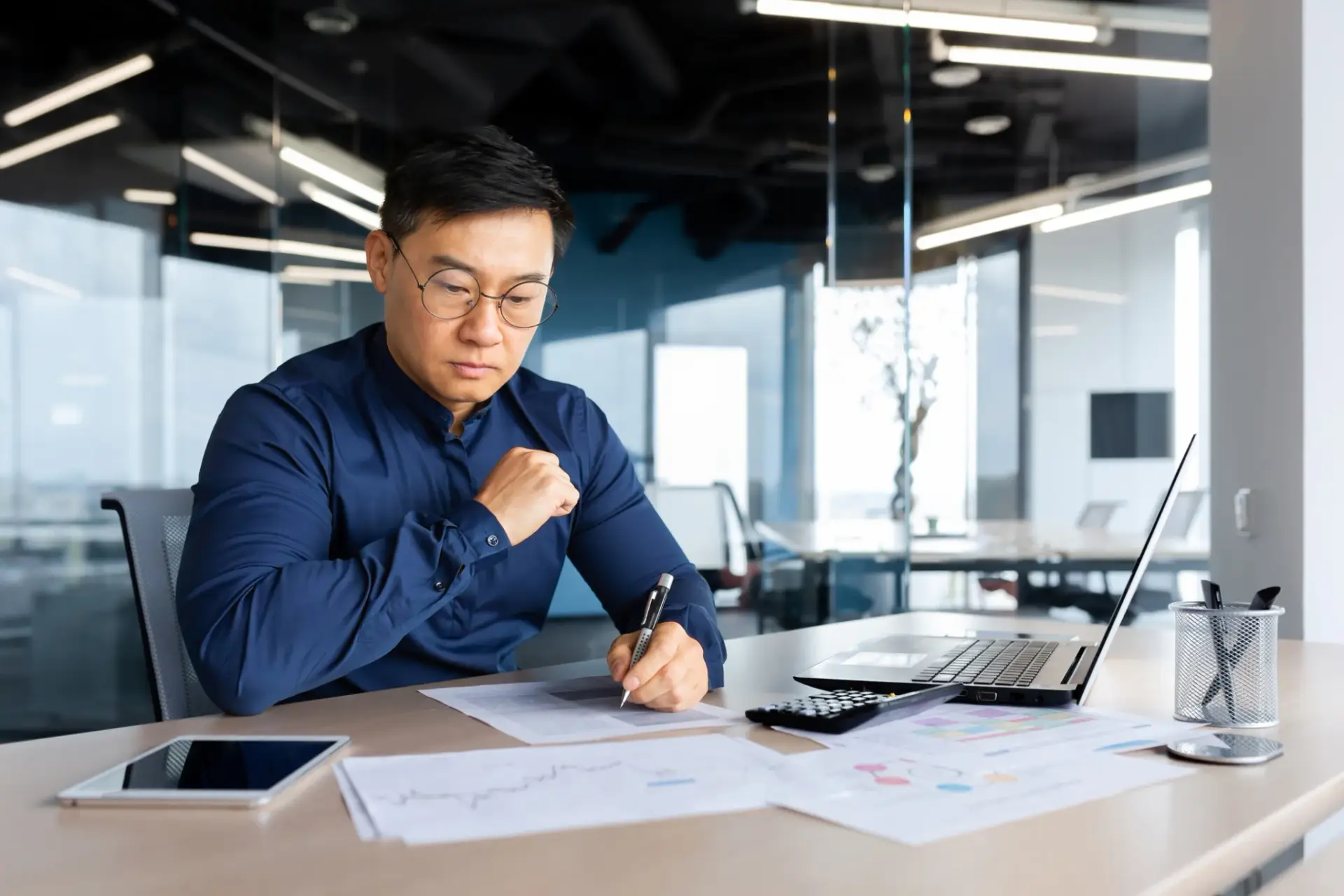 chinese man taking notes