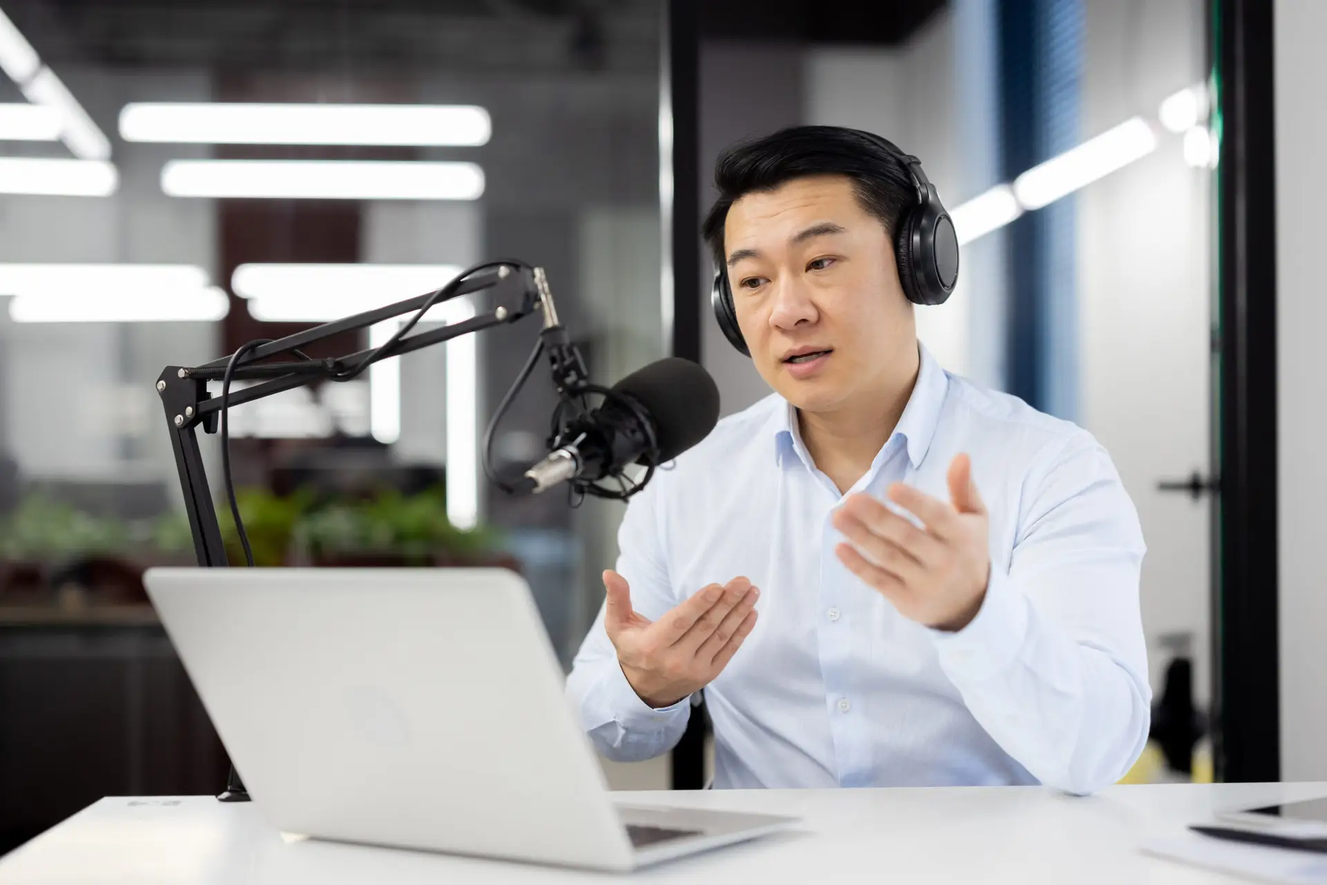 Professional asian male podcaster