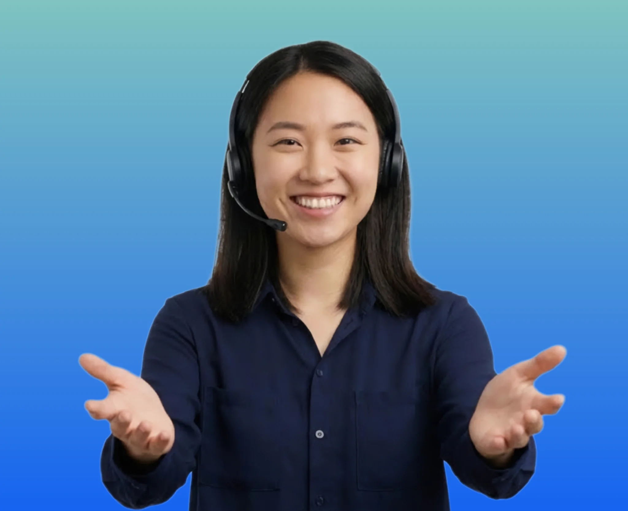 Female Mandarin interpreter with headset on smiling at the camera
