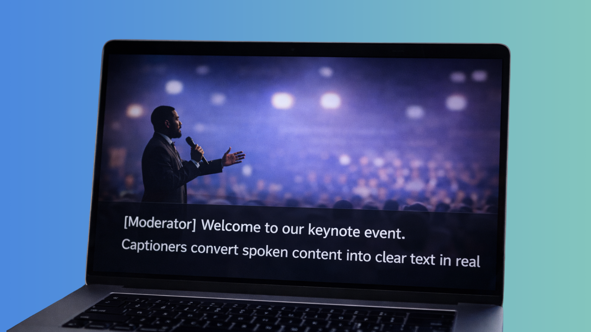 A laptop streaming a live keynote event, showing a speaker on stage with large real-time captions displayed across the bottom of the screen that read: “[Moderator] Welcome to our keynote event. Captioners convert spoken content into clear text in real time.”